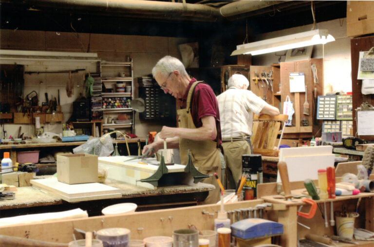 Residents working in the workshop on the Medford Campus